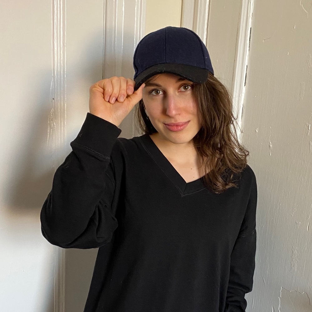 Hat. Black and dark blue color